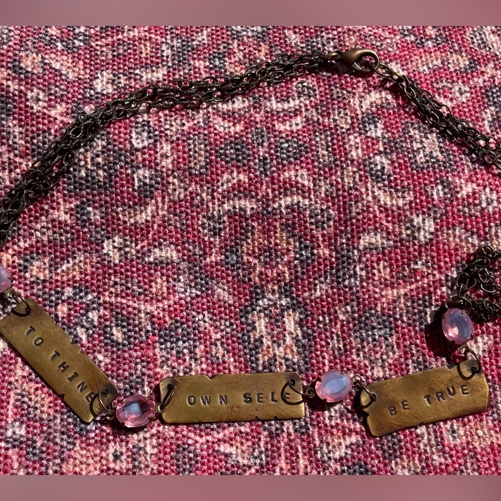 Handmade necklace with copper tags embossed with “to thine own self be true”